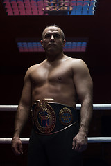 Image showing kick boxer with his championship belt