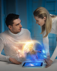 Image showing couple with tablet pc at space laboratory