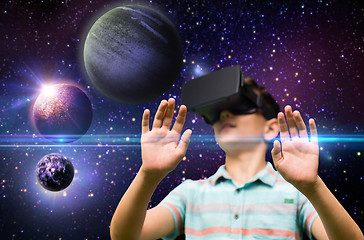 Image showing boy with virtual reality headset outdoors