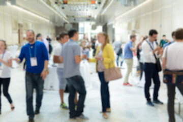 Image showing Blured image of businesspeople at coffee break at conference meeting.