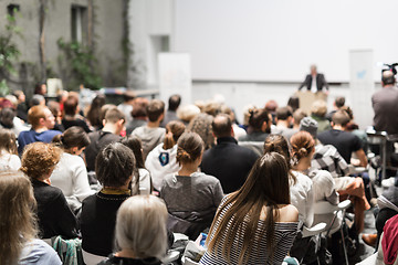 Image showing Business speaker giving a talk at business conference event.