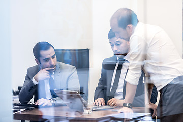 Image showing Corporate businessteam working in modern office.