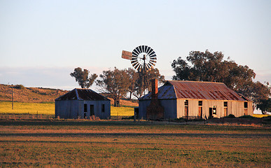 Image showing Farm outbuildings in late afternoon light