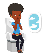 Image showing Young woman suffering from fear of flying.