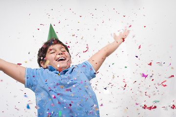 Image showing kid blowing confetti