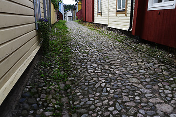 Image showing cobblestone pavement and wooden old houses in Porvoo, Finland