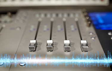 Image showing music mixing console at sound recording studio