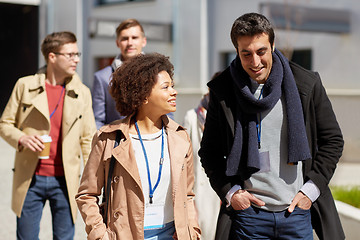 Image showing business team with conference badges in city