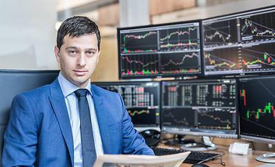 Image showing Business portrait of stock broker in traiding office.