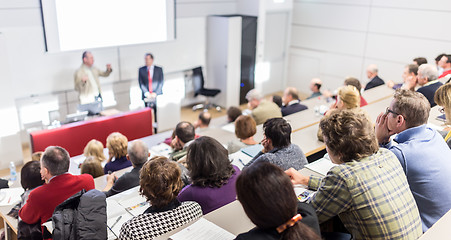 Image showing Business speaker giving a talk at business conference event.