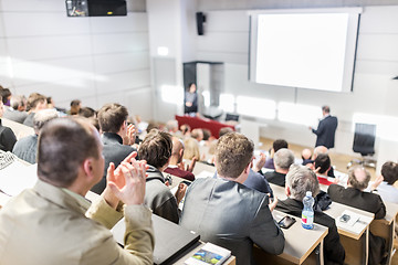 Image showing Business speaker giving a talk at business conference event.