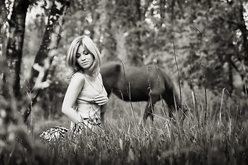 Image showing Sepia Portrait Of A Blonde Woman In The Forest