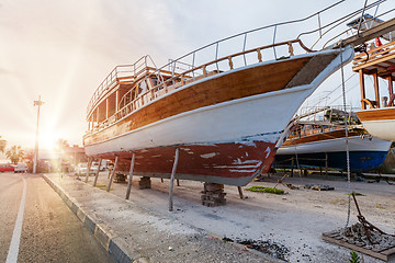 Image showing Vintage boats waiting fo reparation