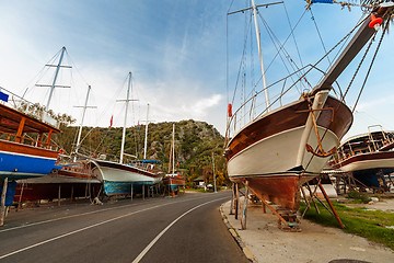 Image showing Vintage boats waiting fo reparation