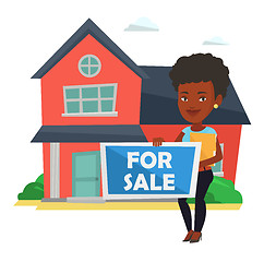 Image showing Young african-american realtor offering house.