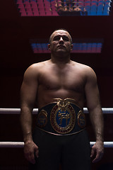 Image showing kick boxer with his championship belt