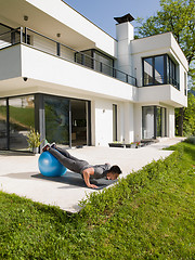 Image showing man doing morning yoga exercises