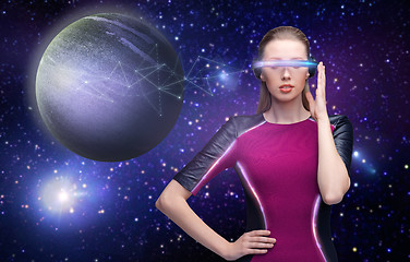 Image showing woman in virtual reality glasses over space