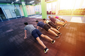 Image showing group of people exercising in gym