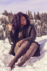 Image showing Happy African woman in winter