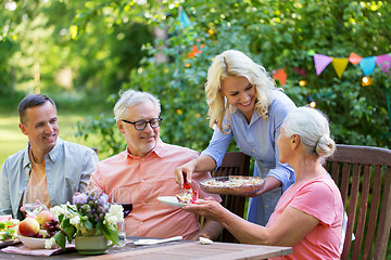 Image showing happy family having dinner or summer garden party