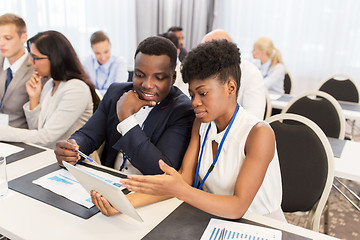 Image showing team with tablet pc at business conference