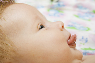 Image showing Baby with tongue hanging out