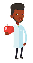 Image showing Nutritionist offering fresh red apple.