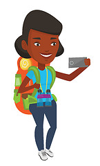 Image showing Woman with backpack making selfie.