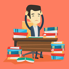 Image showing Student sitting at the table with piles of books.