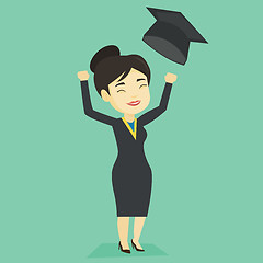 Image showing Graduate throwing up graduation hat.