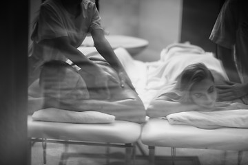 Image showing couple receiving a back massage