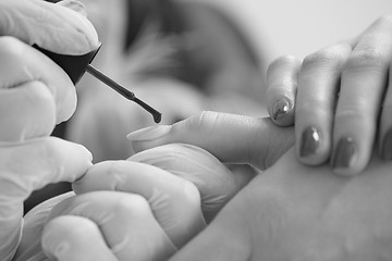 Image showing Woman hands receiving a manicure