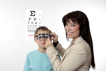 Image showing Optometrist and child patient