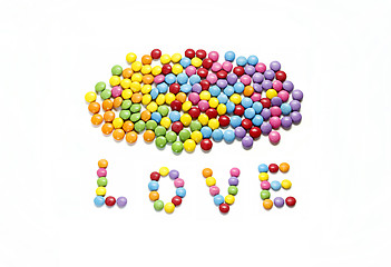 Image showing Word ''Love'' and bright colorful candy 