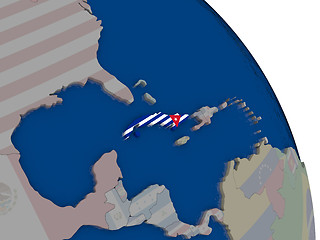 Image showing Cuba with flag on globe