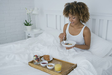 Image showing Content woman having breakfast in bed