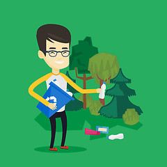 Image showing Man collecting garbage in forest.