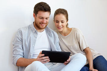 Image showing happy couple with tablet pc computer