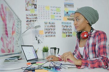 Image showing Stylish young woman working in office