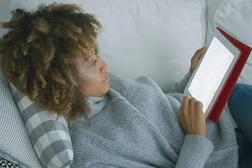 Image showing Casual woman spending time with tablet