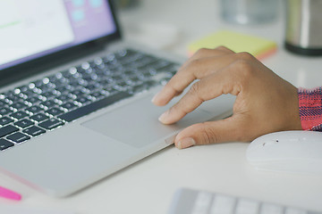 Image showing Anonymous woman using laptop