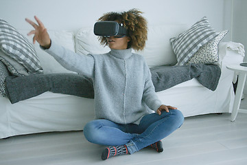 Image showing Woman enjoying VR glasses