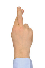 Image showing Crossed fingers on white