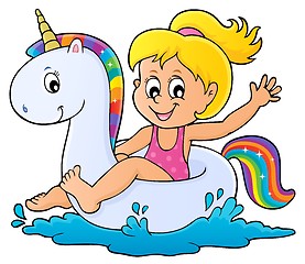 Image showing Girl floating on inflatable unicorn 1
