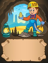 Image showing Small parchment and miner with ore