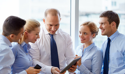 Image showing business team with tablet pc computer at office