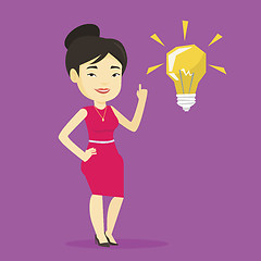 Image showing Student pointing at idea bulb vector illustration