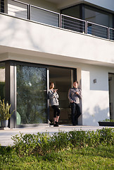 Image showing couple enjoying on the door of their luxury home villa