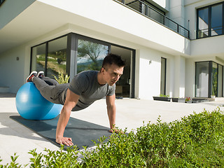 Image showing man doing morning yoga exercises